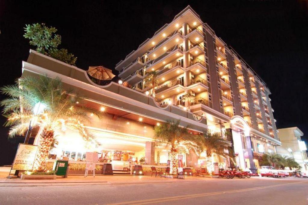 a lit up building with christmas lights on it at LK Royal Suite in Pattaya