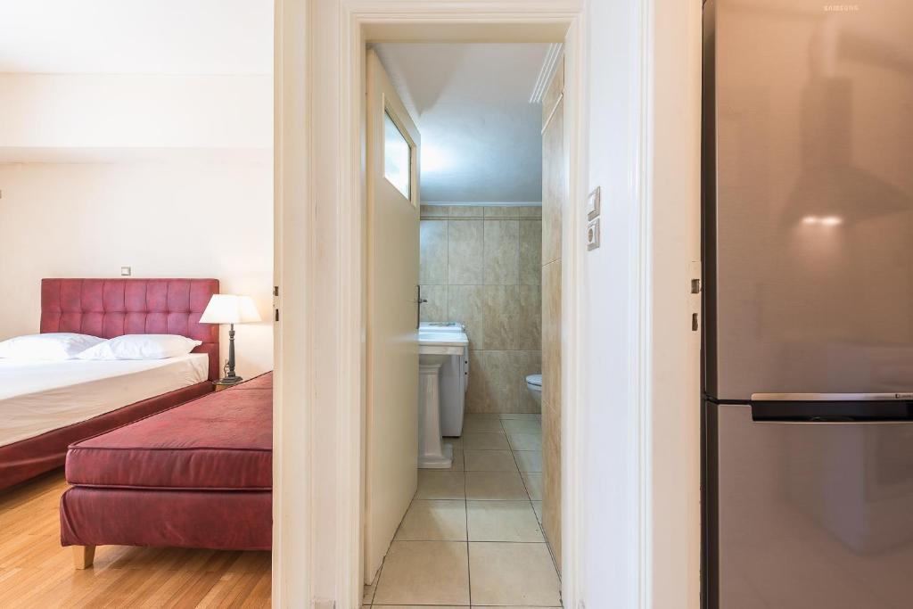 Postel nebo postele na pokoji v ubytování Victoria Familia Apartments