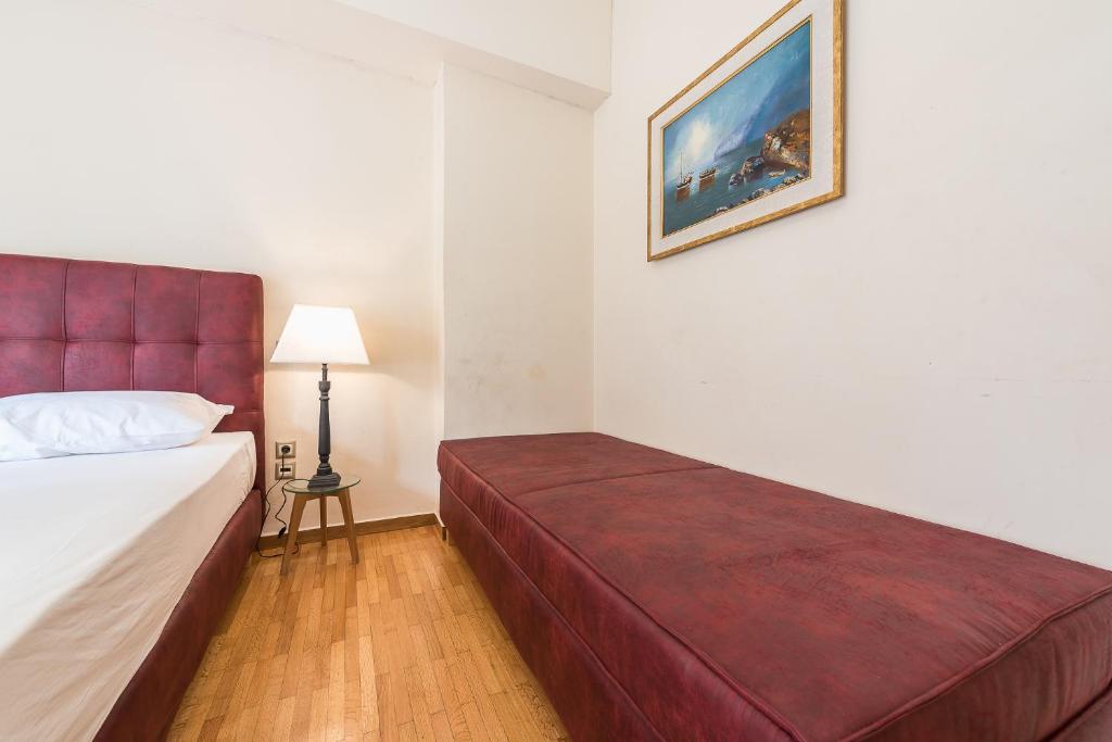 Postel nebo postele na pokoji v ubytování Victoria Familia Apartments
