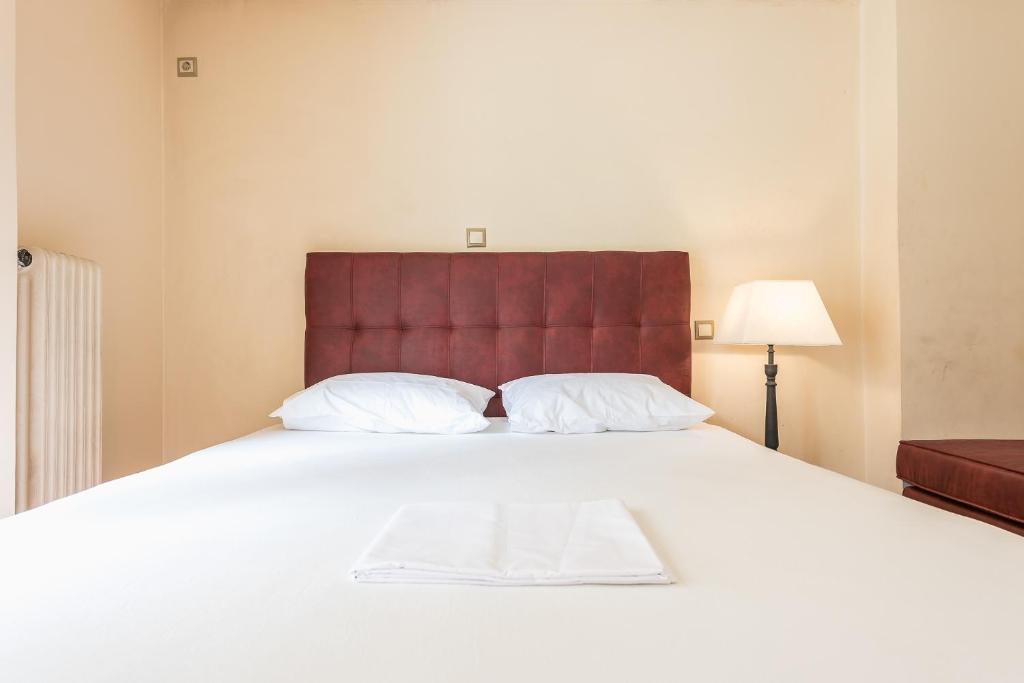 Postel nebo postele na pokoji v ubytování Victoria Familia Apartments