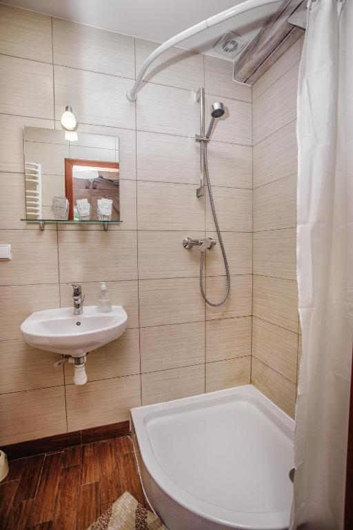 Koupelna v ubytování Guest House "Arkhistratyg"