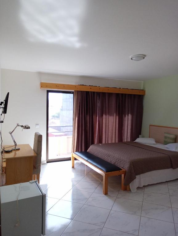 Postel nebo postele na pokoji v ubytování LT Aparthotel