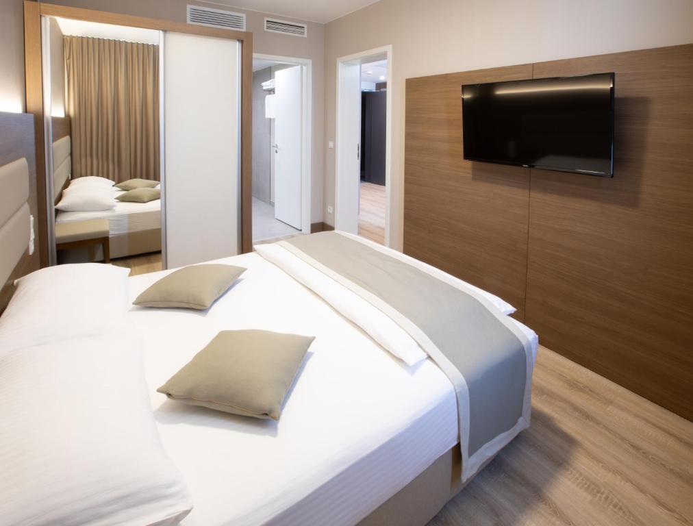 Postel nebo postele na pokoji v ubytování Ocak Aparthotel