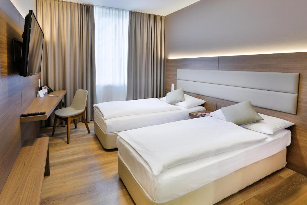 Postel nebo postele na pokoji v ubytování Ocak Aparthotel