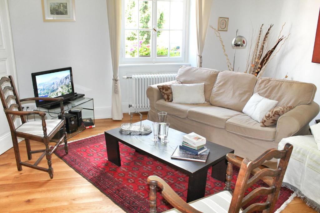 TV a/nebo společenská místnost v ubytování La Maison des Fontaines d'Alsace