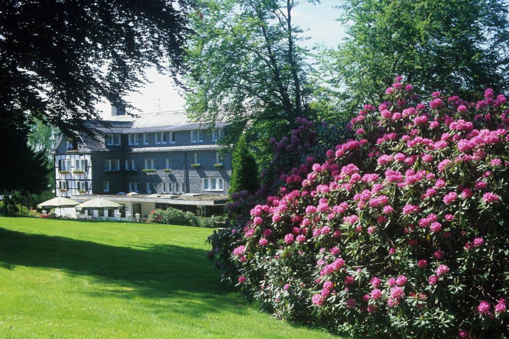 Een tuin van Hotel Jagdhaus Wiese