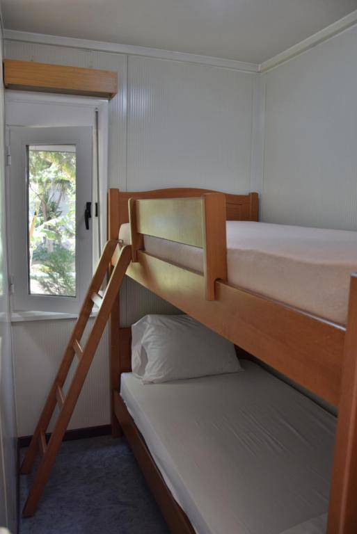 Postel nebo postele na pokoji v ubytování Camping Chania