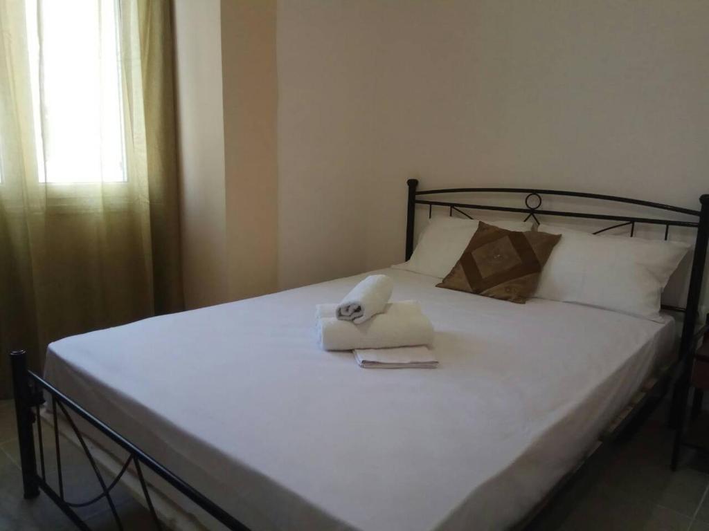 Кровать или кровати в номере Glaros