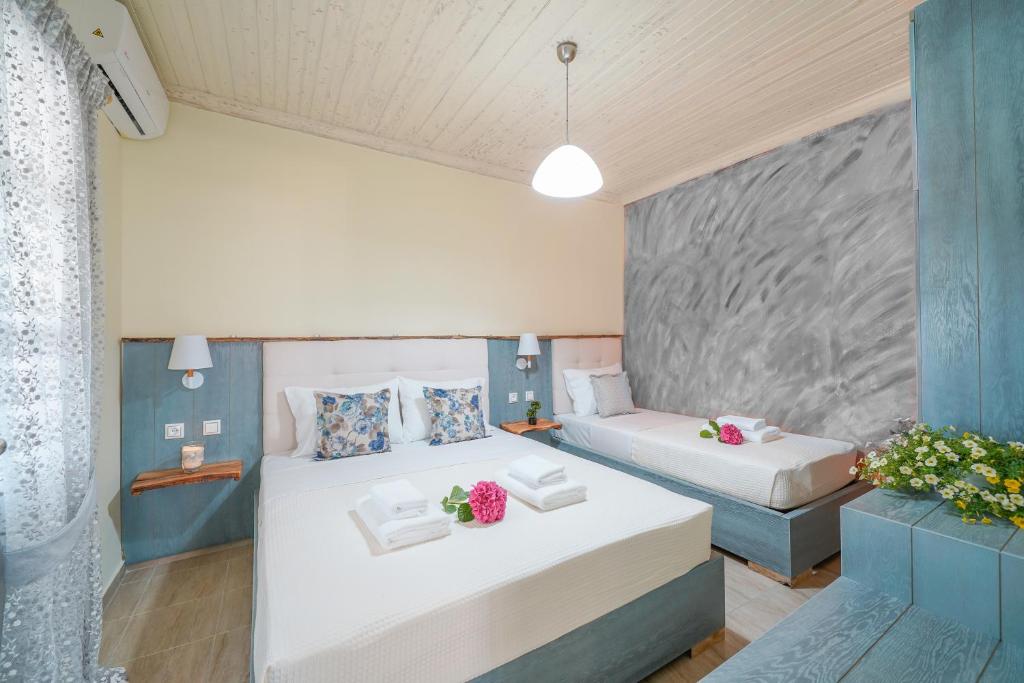 A bed or beds in a room at Blue Sea Paradise