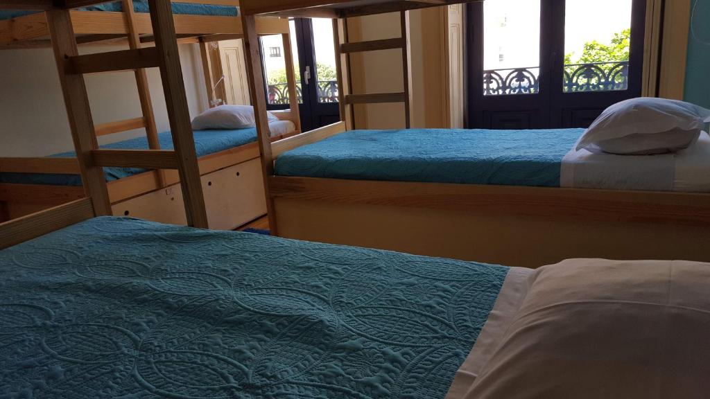 Postel nebo postele na pokoji v ubytování CoolHostel