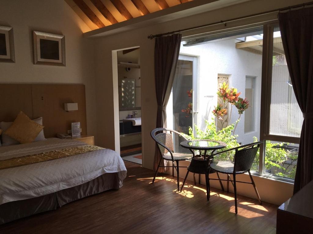 Postel nebo postele na pokoji v ubytování Shanze Bora villa