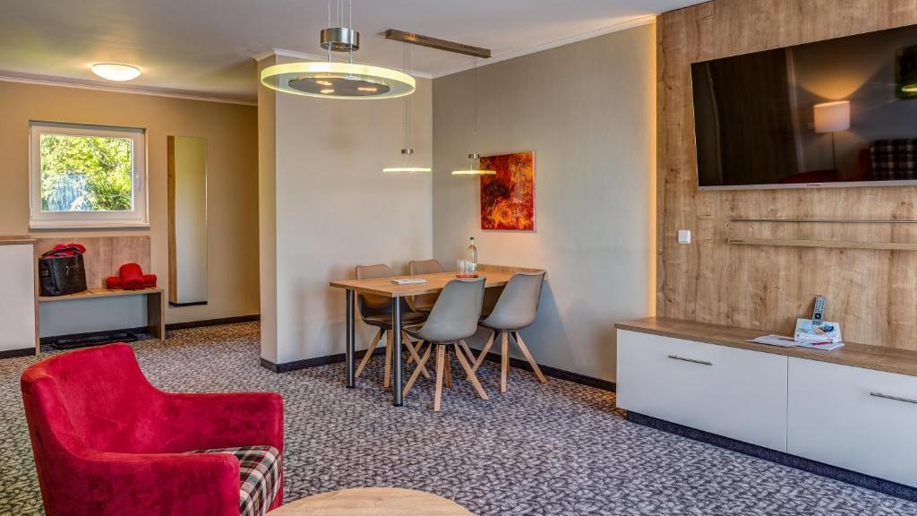 TV a/nebo společenská místnost v ubytování Hotel & Pension Traumblick