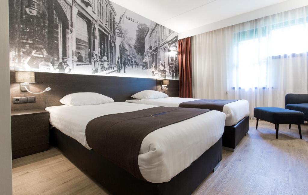Postel nebo postele na pokoji v ubytování Bastion Hotel Bussum Hilversum