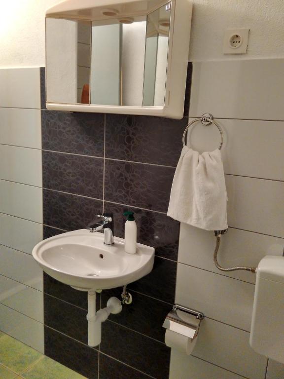 Łazienka w obiekcie Apartments Sonija