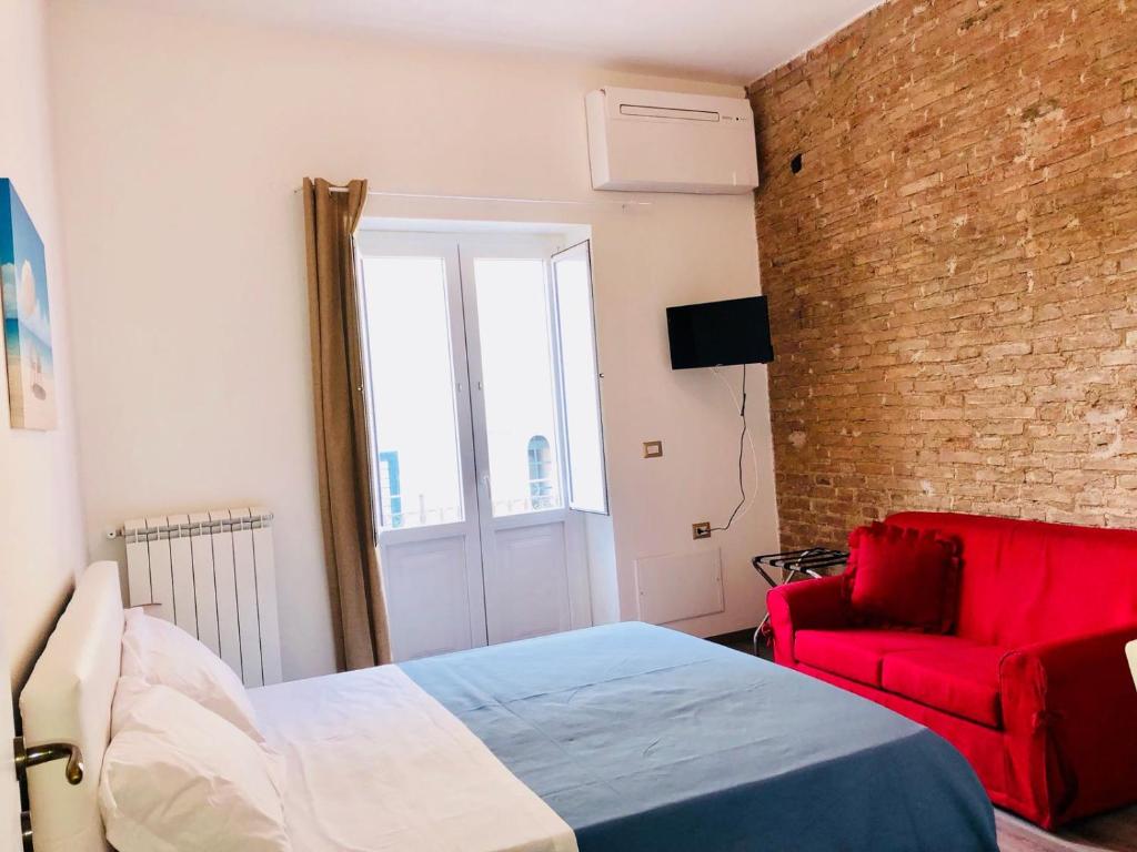 Postel nebo postele na pokoji v ubytování Residence Nina