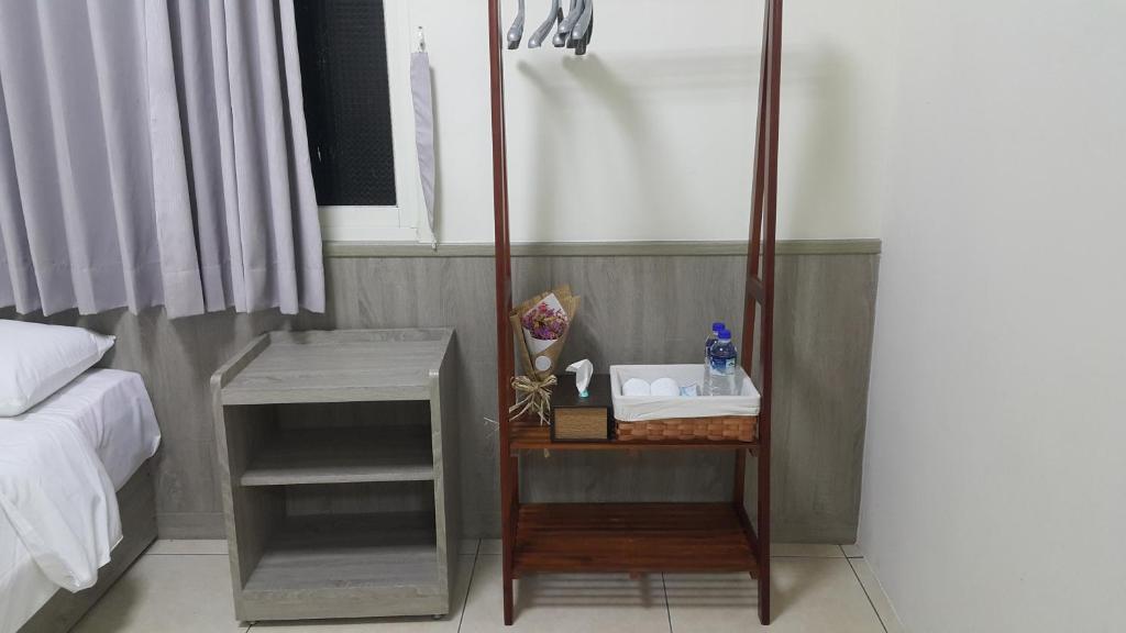 Postel nebo postele na pokoji v ubytování Yahweh Homestay
