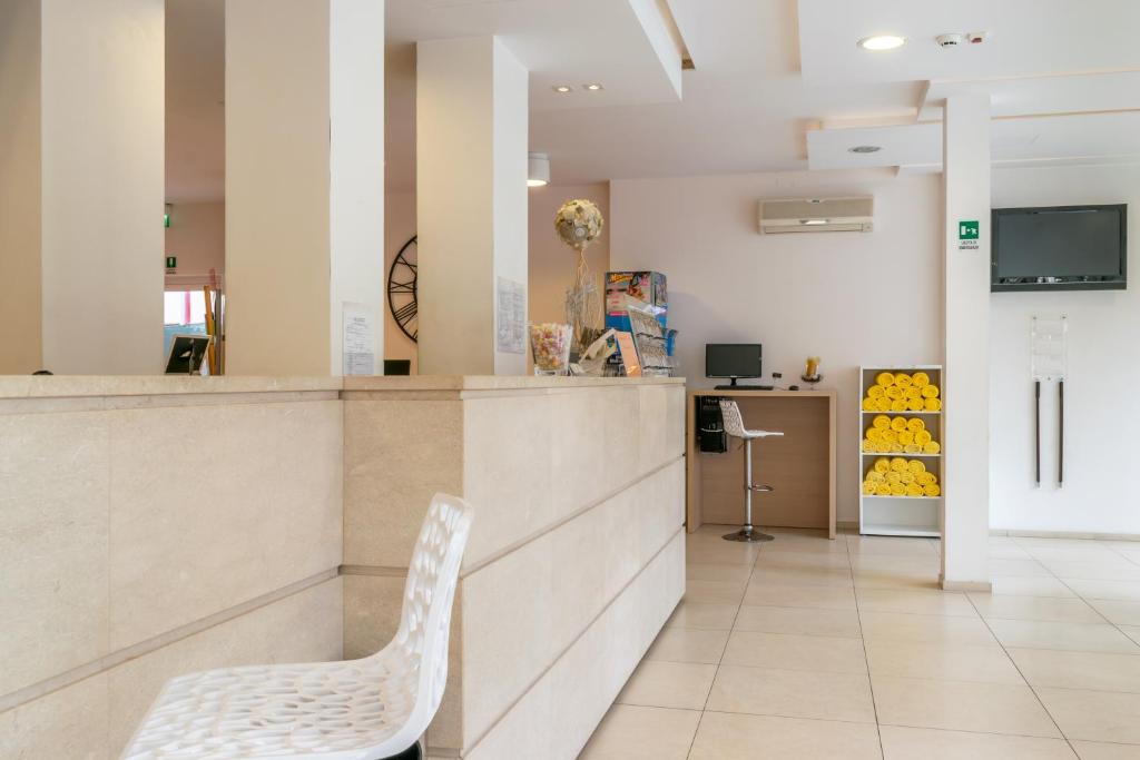 Kuchyň nebo kuchyňský kout v ubytování Hotel Rubens