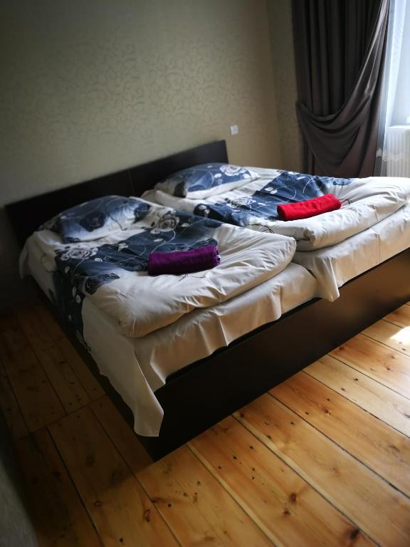 Postel nebo postele na pokoji v ubytování Guesthouse suja