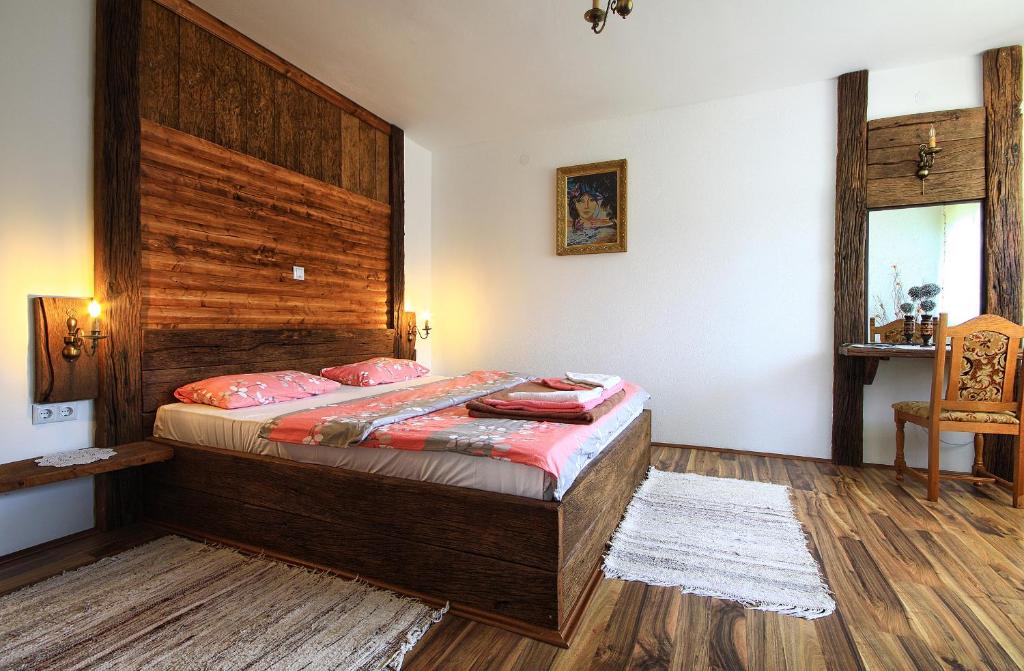 Postel nebo postele na pokoji v ubytování Guest House Bunčić Rooms & Apartments