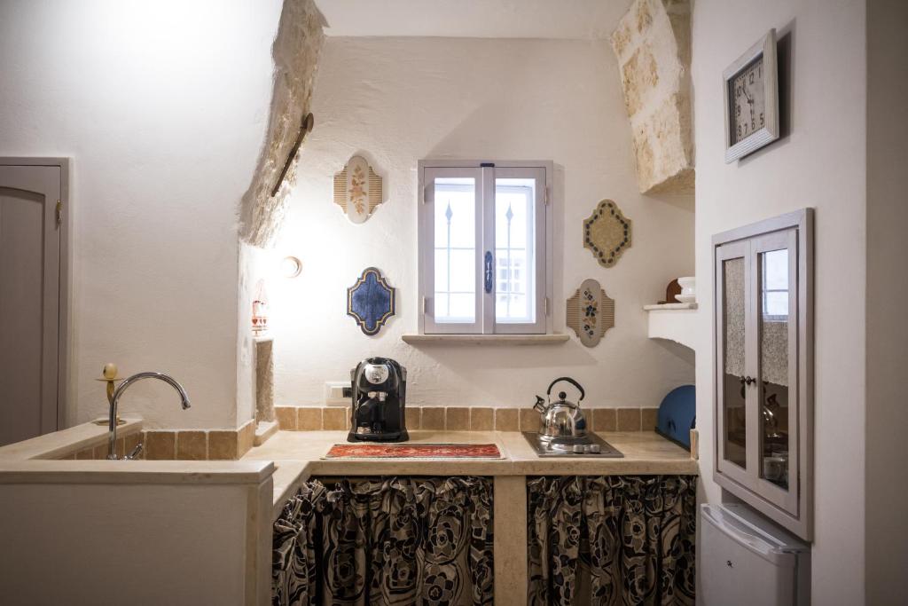 Kuchyň nebo kuchyňský kout v ubytování Al Caveau - Holiday House
