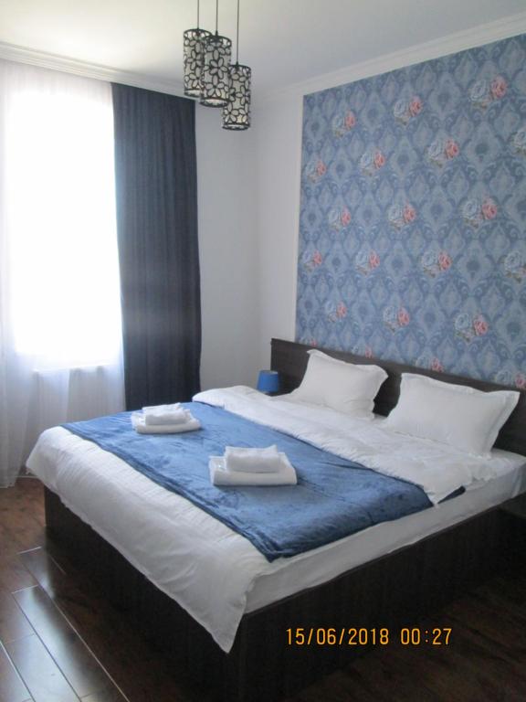 Letto o letti in una camera di Guesthouse Elli & Cottages