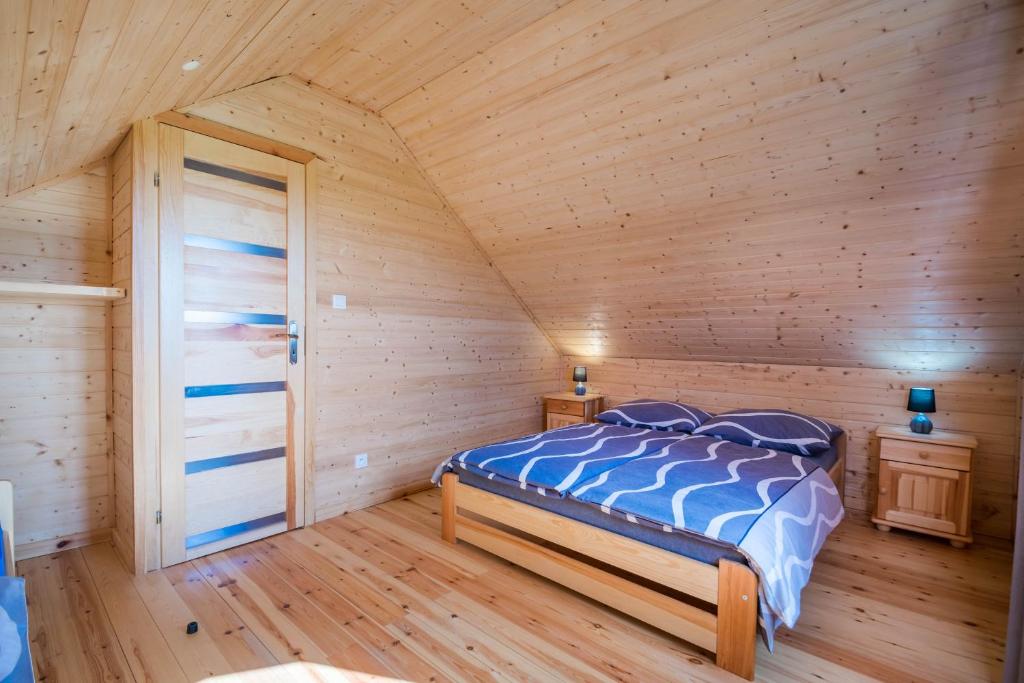 Postel nebo postele na pokoji v ubytování Na Slonecznym Wzgorzu