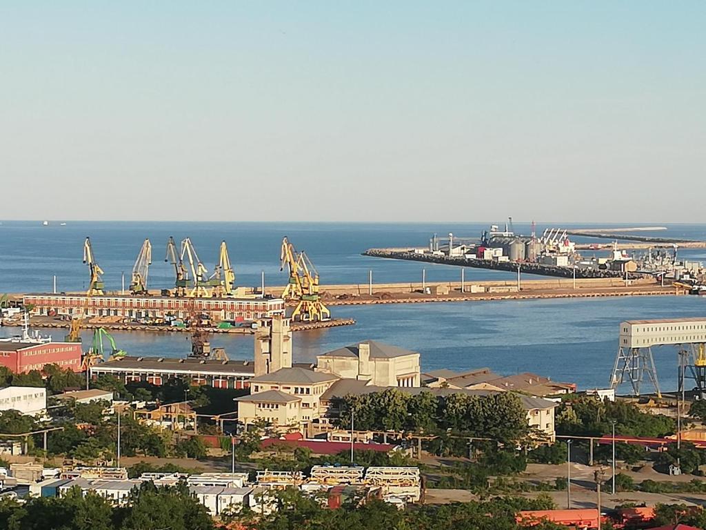 an aerial view of a port with a ship in the water at Apartament Harbour View in Constanţa