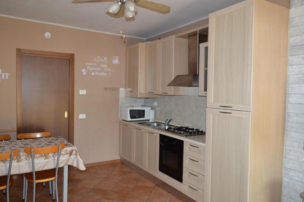 Kuchyň nebo kuchyňský kout v ubytování Il Melograno b&b Apartament
