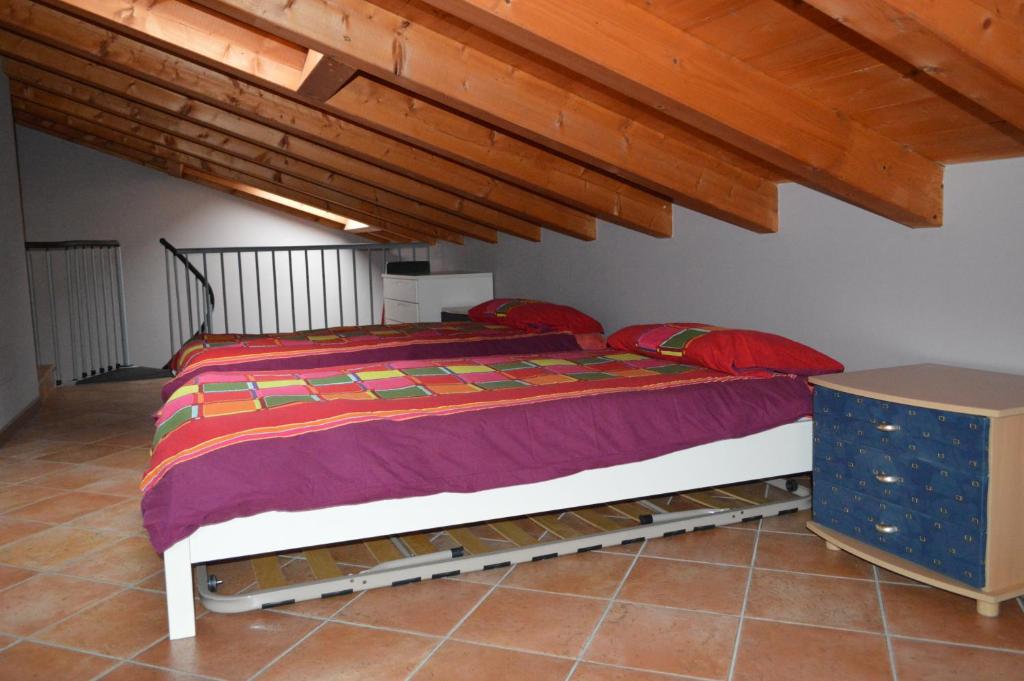 Postel nebo postele na pokoji v ubytování Il Melograno b&b Apartament