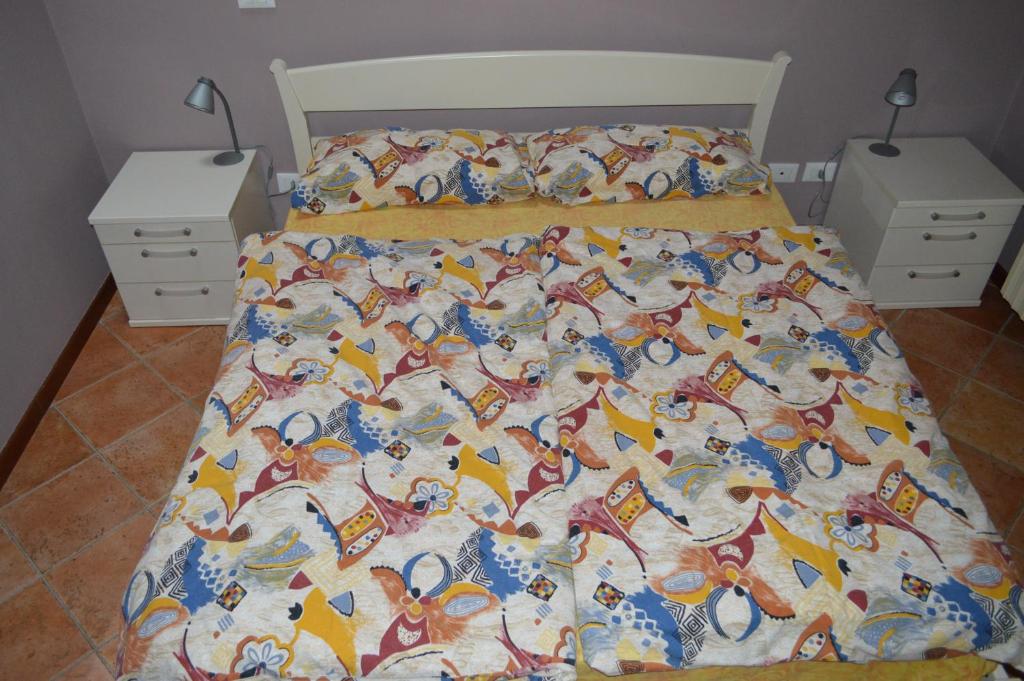 Postel nebo postele na pokoji v ubytování Il Melograno b&b Apartament