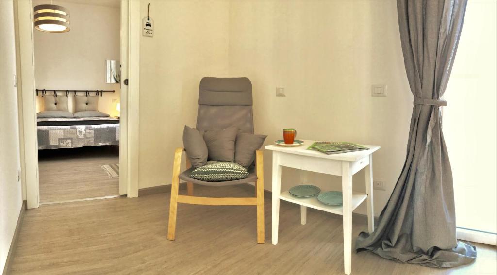 A bed or beds in a room at Gardaselle Holiday Rooms