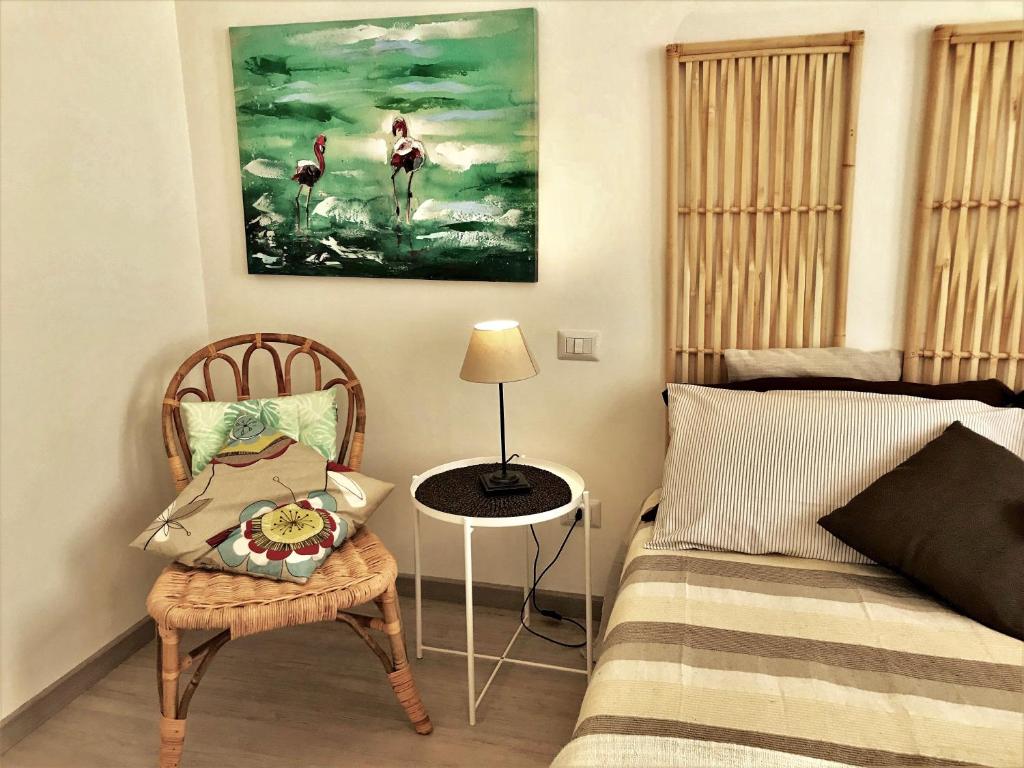 A bed or beds in a room at Gardaselle Holiday Rooms