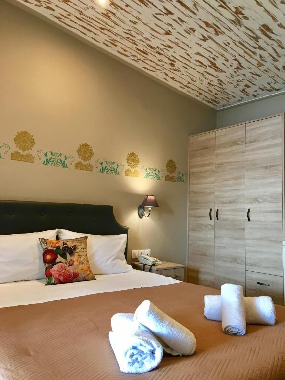 Postel nebo postele na pokoji v ubytování Venus Beach Hotel