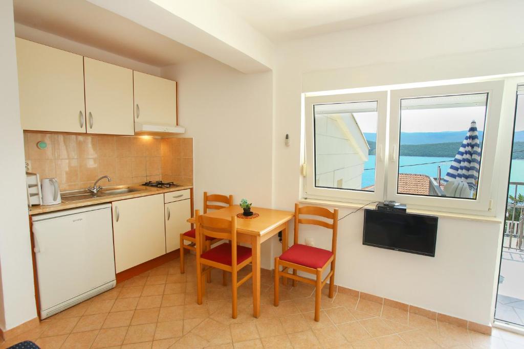 Kuchyň nebo kuchyňský kout v ubytování Guesthouse Lamia