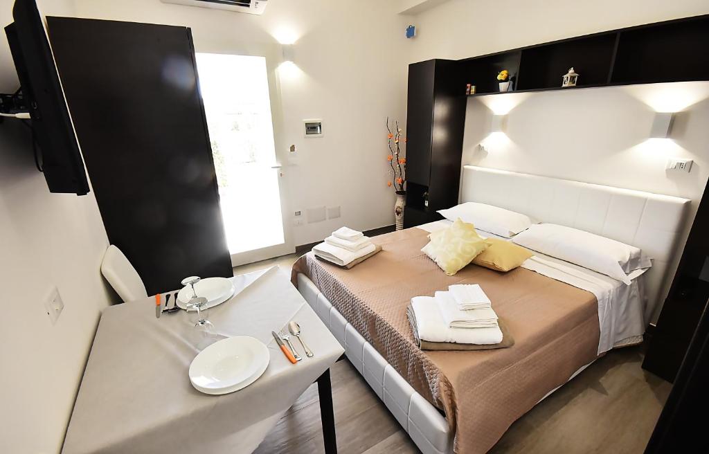 Postel nebo postele na pokoji v ubytování Borgo Fiorito Relais