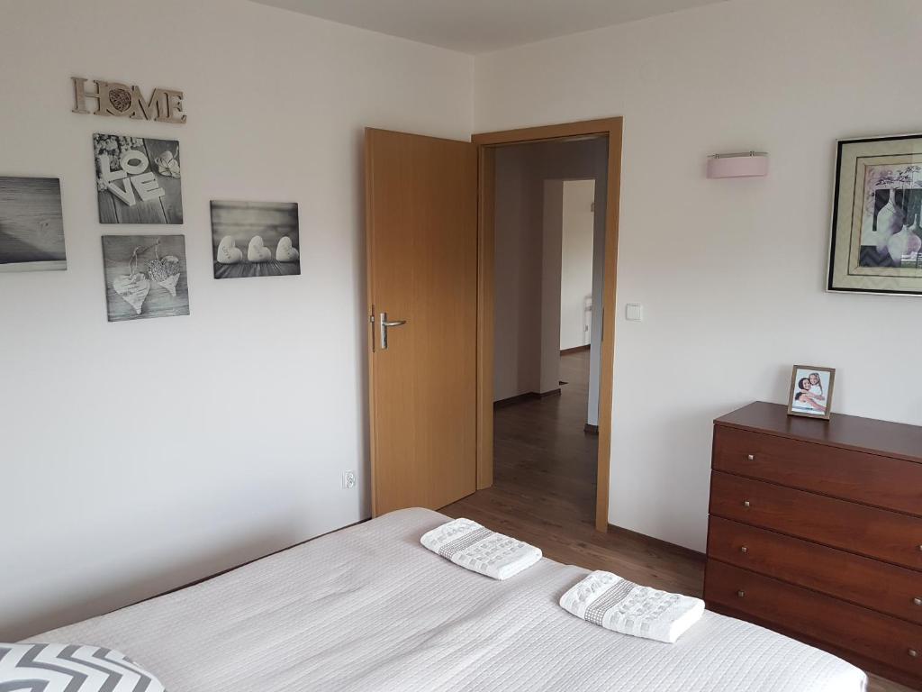 Posteľ alebo postele v izbe v ubytovaní Apartament VIP Vęgoria