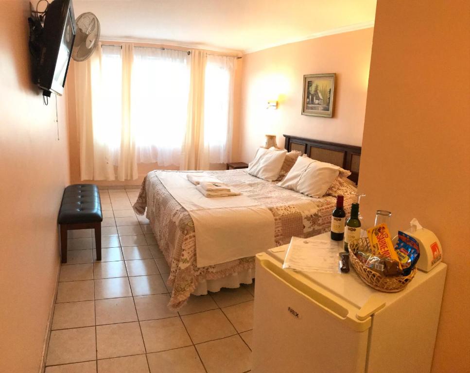Postel nebo postele na pokoji v ubytování Hotel CostaFósil