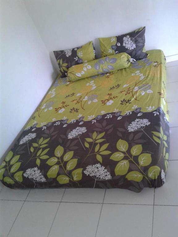 Postel nebo postele na pokoji v ubytování Crispycool Homestay