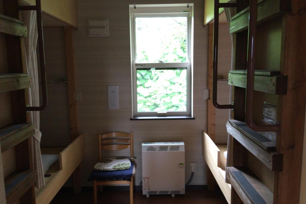 Kuchyň nebo kuchyňský kout v ubytování Niseko Tabi-tsumugi Backpackers