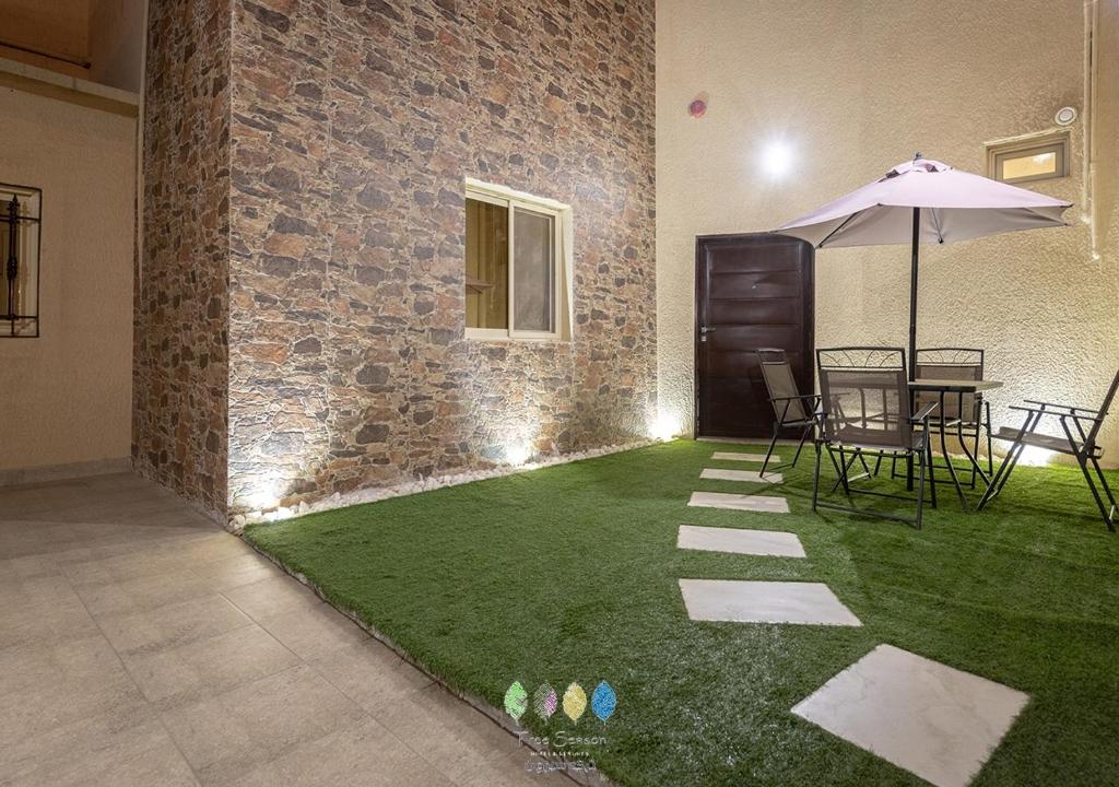 Patio nebo venkovní prostory v ubytování فلل تري سيزون