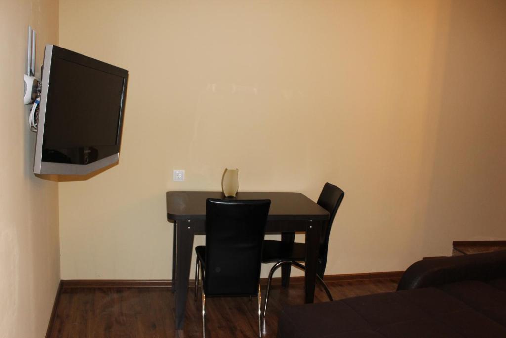 TV a/nebo společenská místnost v ubytování Easy Guest House