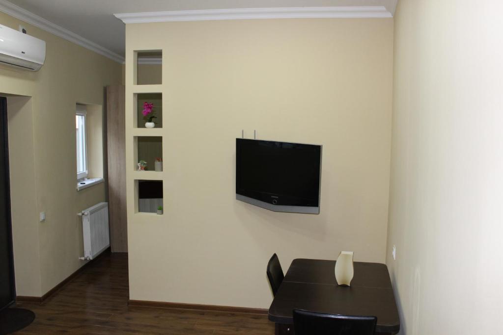 TV a/nebo společenská místnost v ubytování Easy Guest House