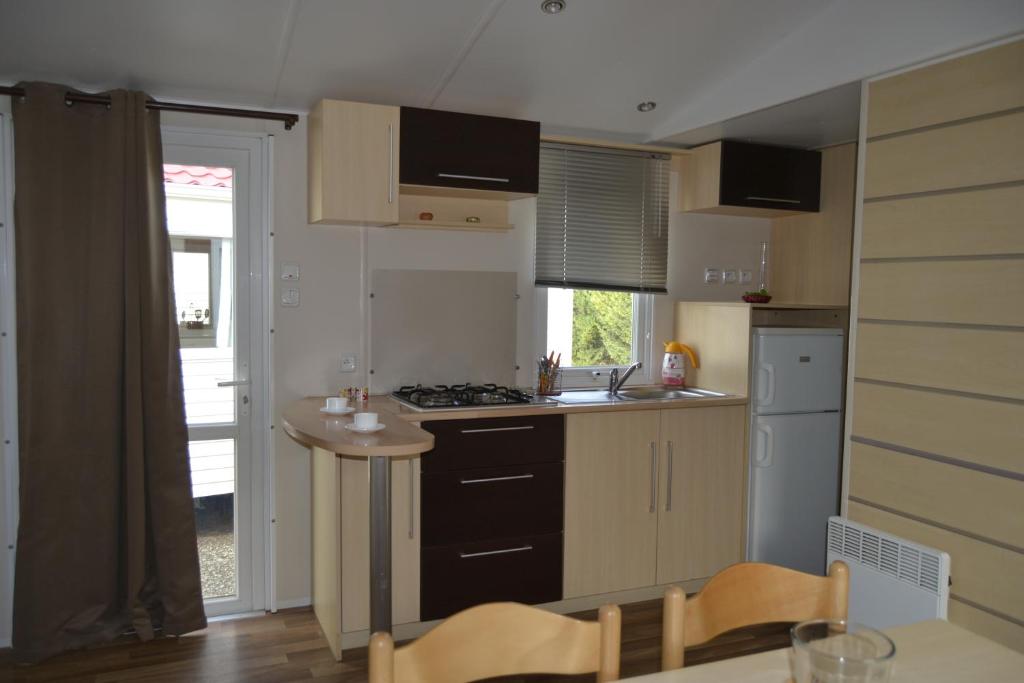 Kuchyň nebo kuchyňský kout v ubytování Camping Pirinenc