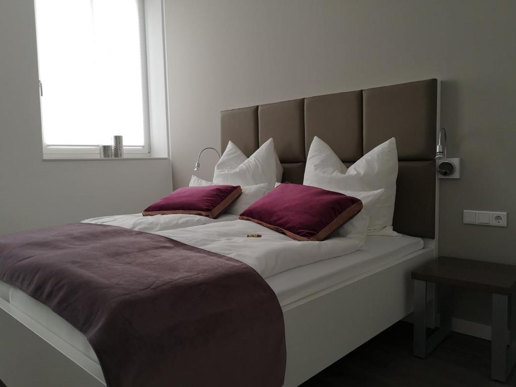 Postel nebo postele na pokoji v ubytování Trip Inn PostApart Aschaffenburg