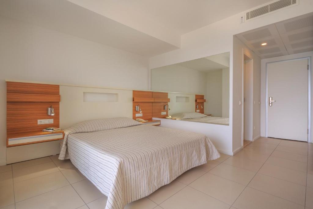 Postel nebo postele na pokoji v ubytování Hotel Delta
