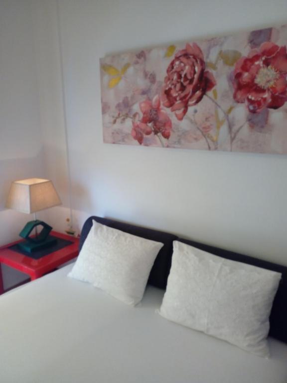 Giường trong phòng chung tại odys apartment centrer of town