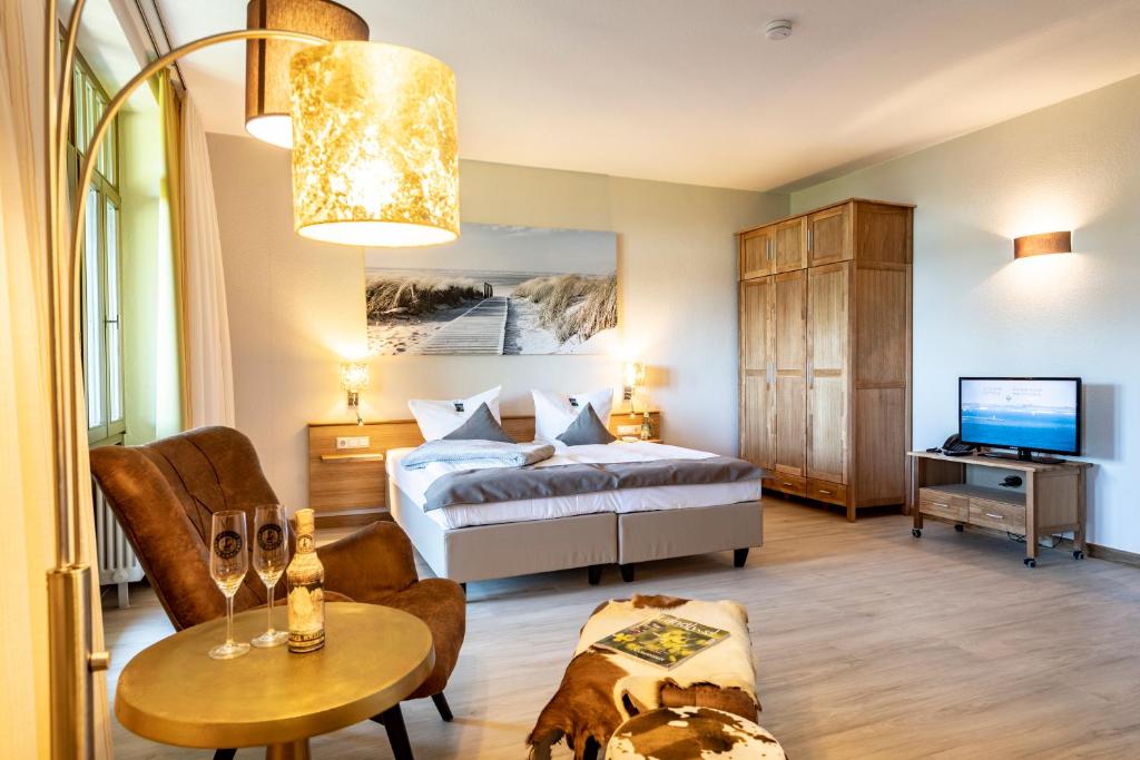 Postel nebo postele na pokoji v ubytování Hotel Villa Halliger