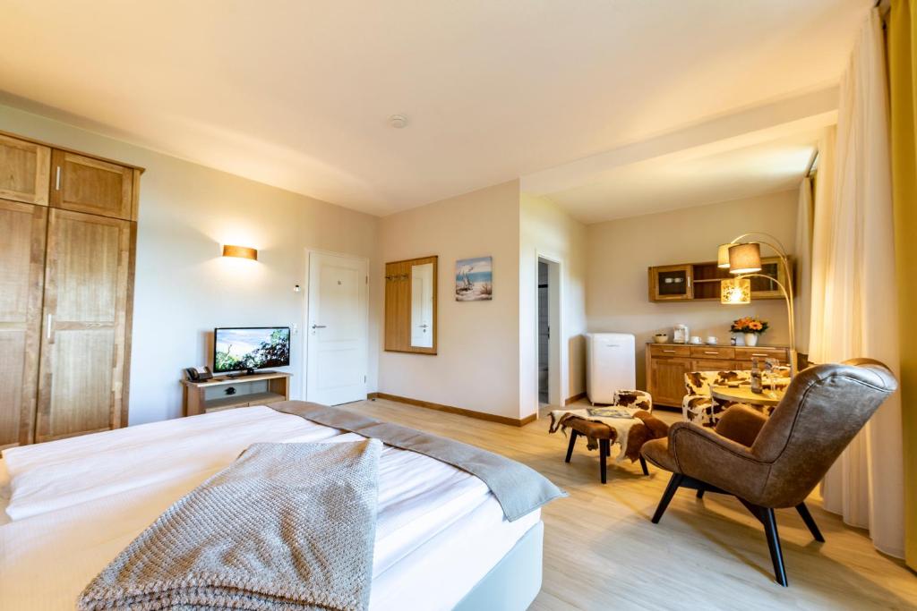 TV a/nebo společenská místnost v ubytování Hotel Villa Halliger