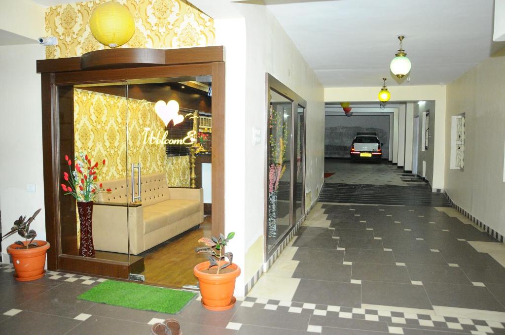 Fotografie z fotogalerie ubytování Hotel Lovely Nest v destinaci Kójamputtúr
