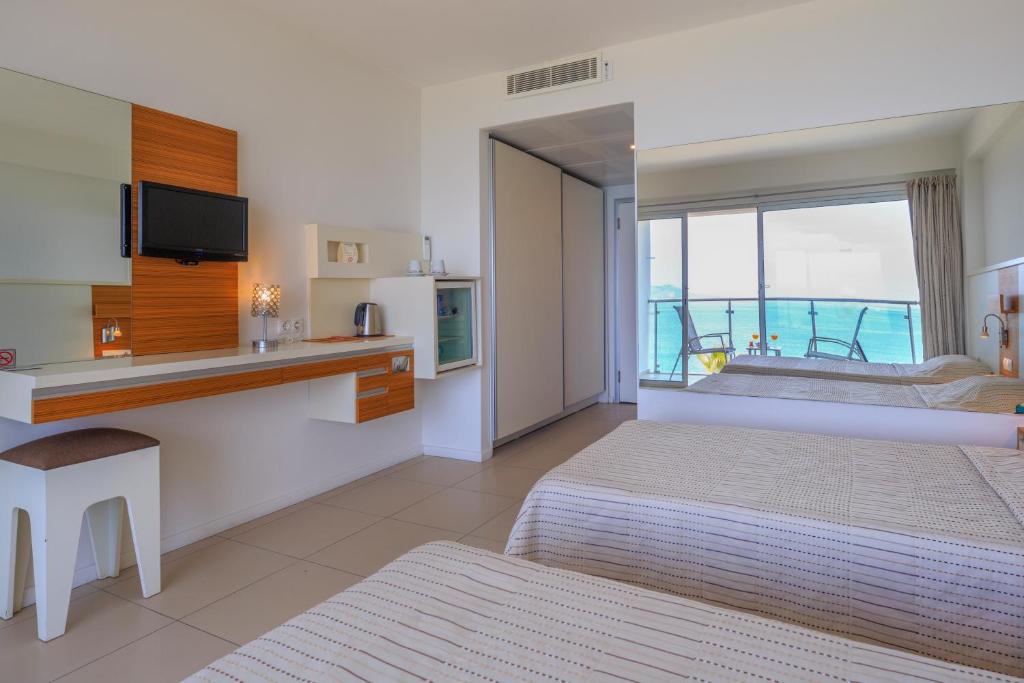 Postel nebo postele na pokoji v ubytování Hotel Delta